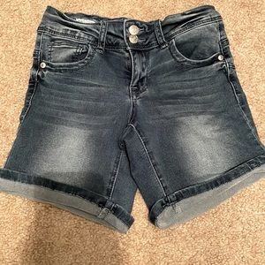 Denim shorts. Medium- dark wash